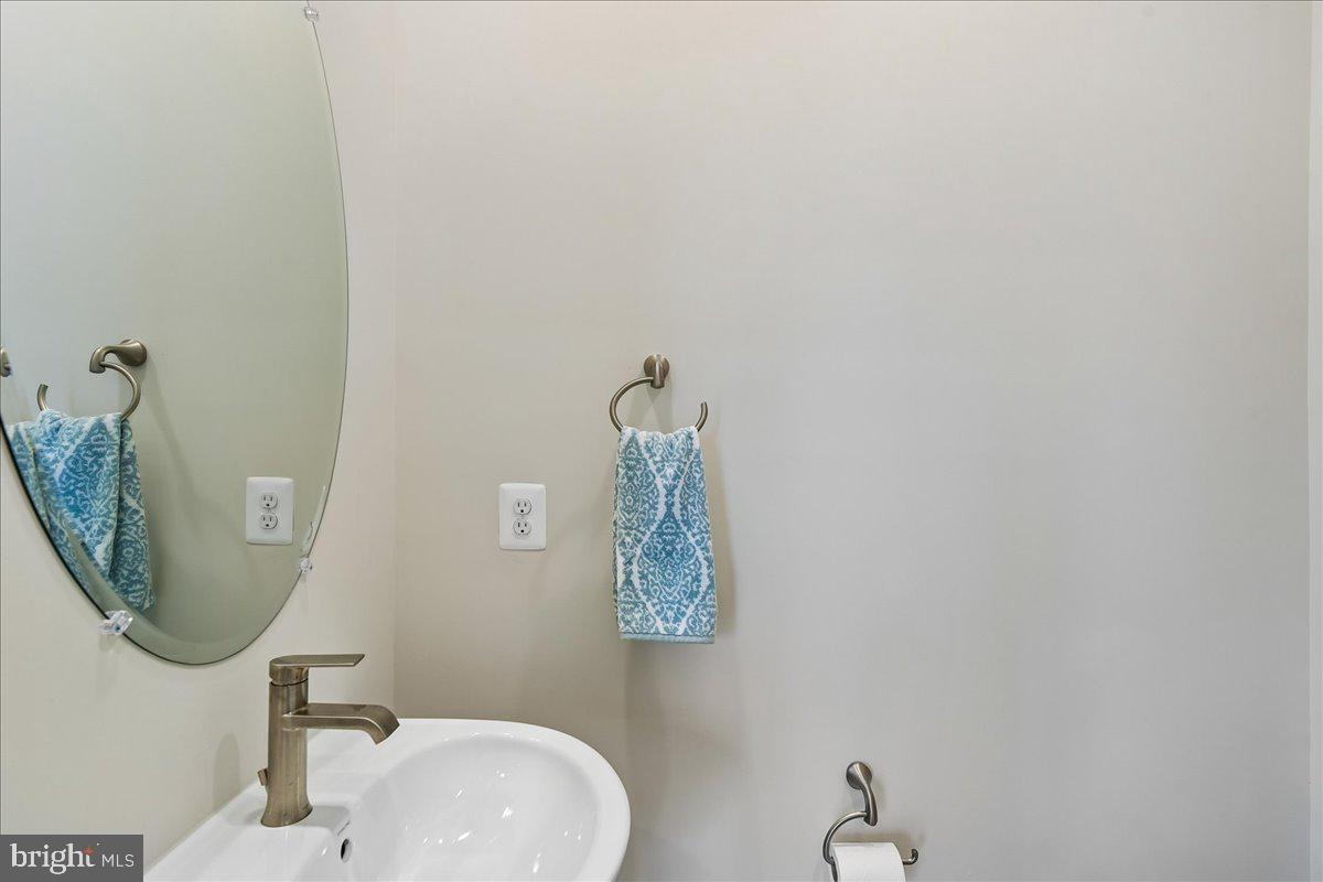 2209 Woodlands Road Windsor Mill, MD 21244 - Photo 20 of 75 POWDER ROOM OFF THE DINING ROOM