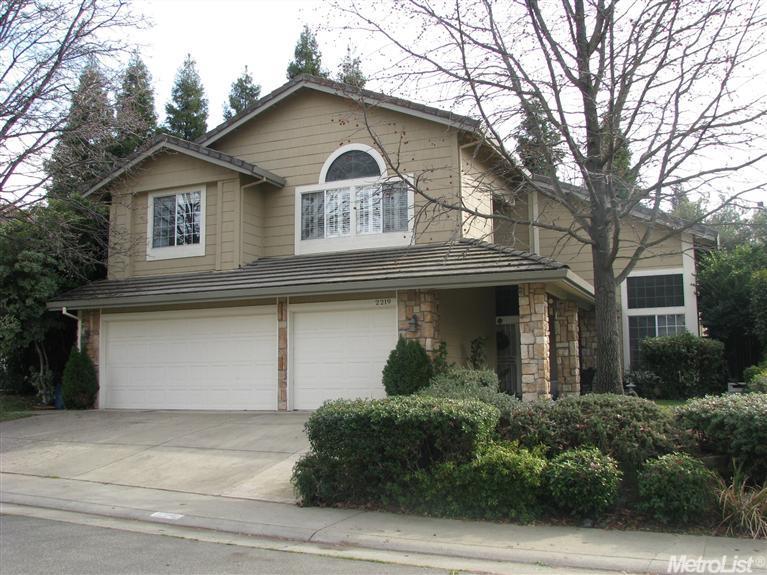 Wow!! What Curb Appeal!! Desirable 3 Car Garage With Abundant Built-In Storage.
