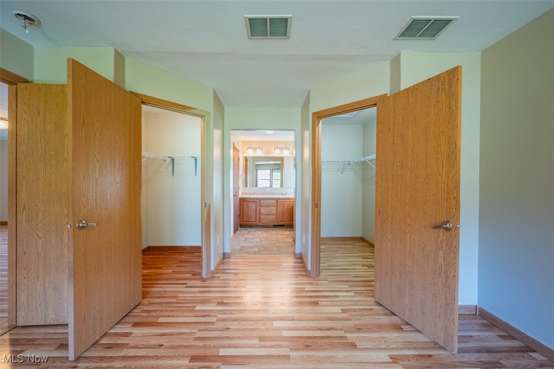 3367 Loomis Ridge Road Parkersburg, WV 26104 - Photo 32 of 43 Hallway featuring light hardwood / wood-style flooring