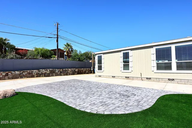 a view of a backyard with a garden