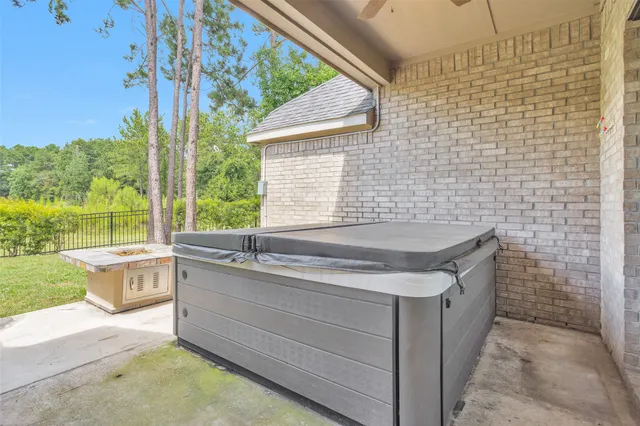 a bathroom with a granite countertop sink and mirror