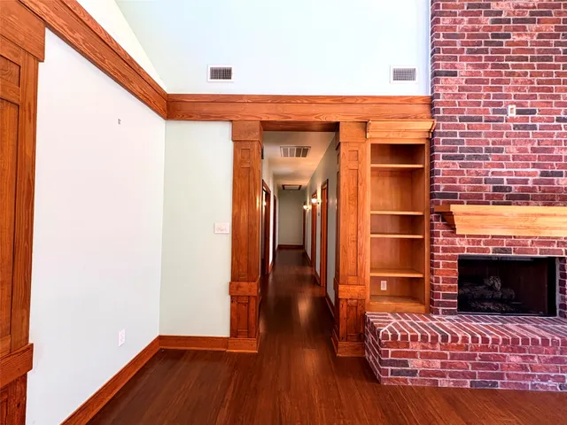 a view of livingroom with hardwood floor and a ceiling fan