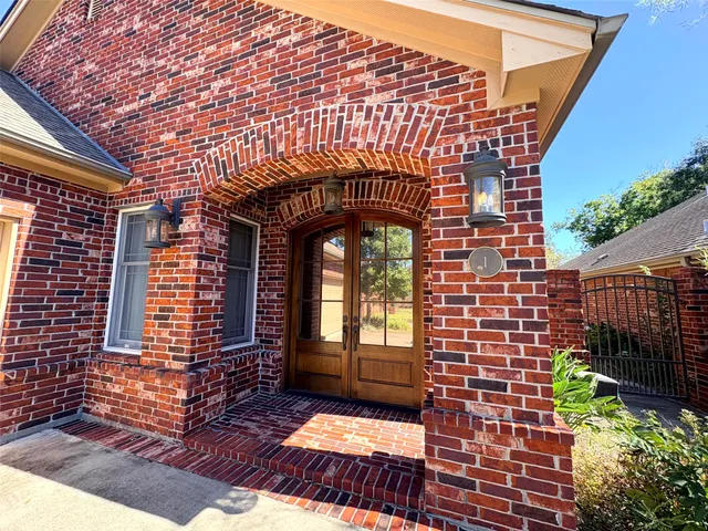 a front view of a house with a garage