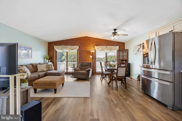 a bed room with a bed and a television