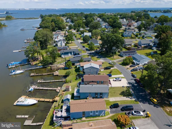 a view of a lake with a house
