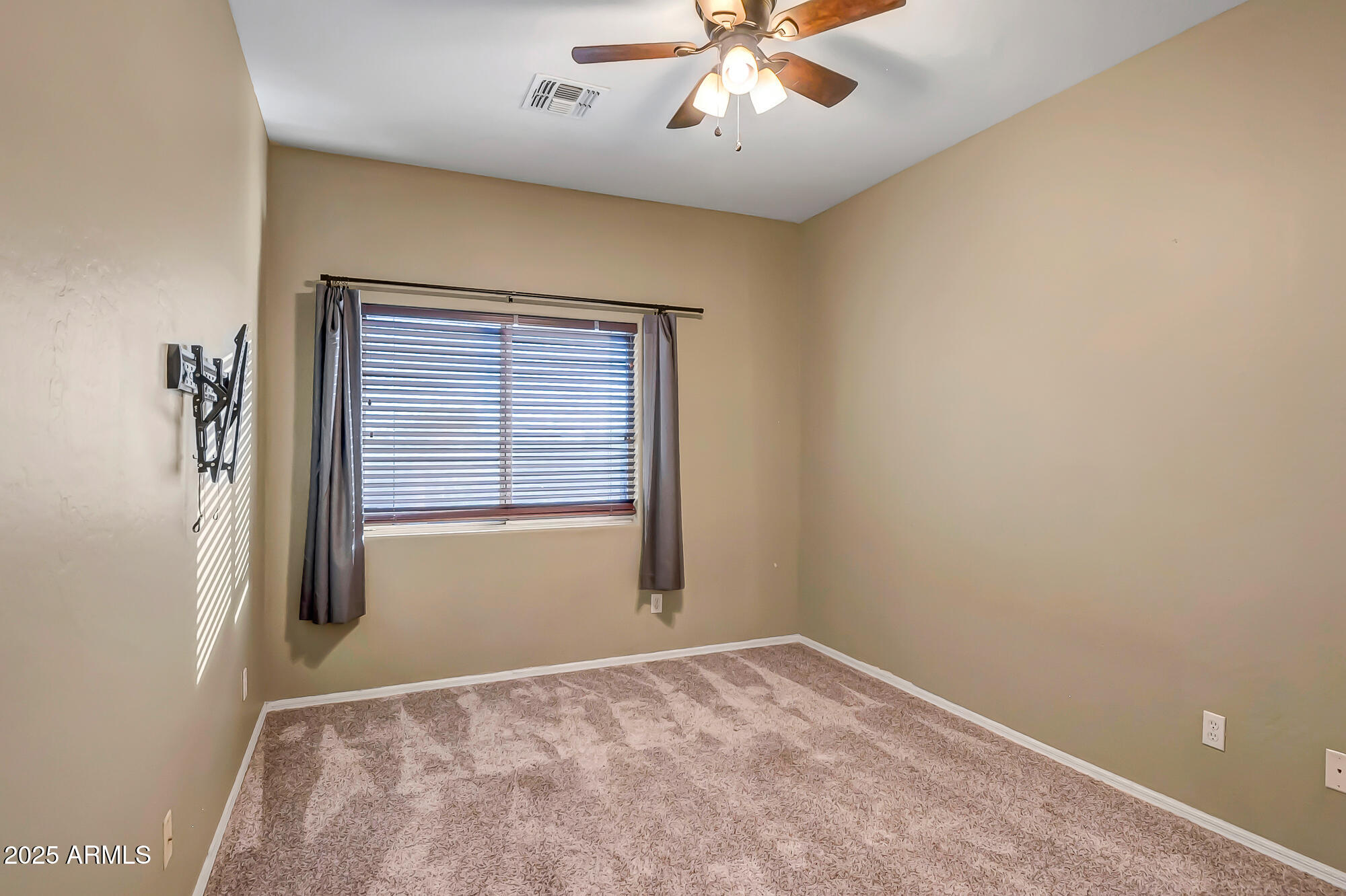 9569 West Redbird Road Peoria, AZ 85383 - Photo 20 of 36 a view of empty room with window