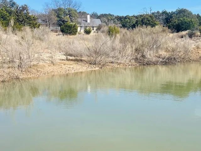 a view of a lake with a mountain
