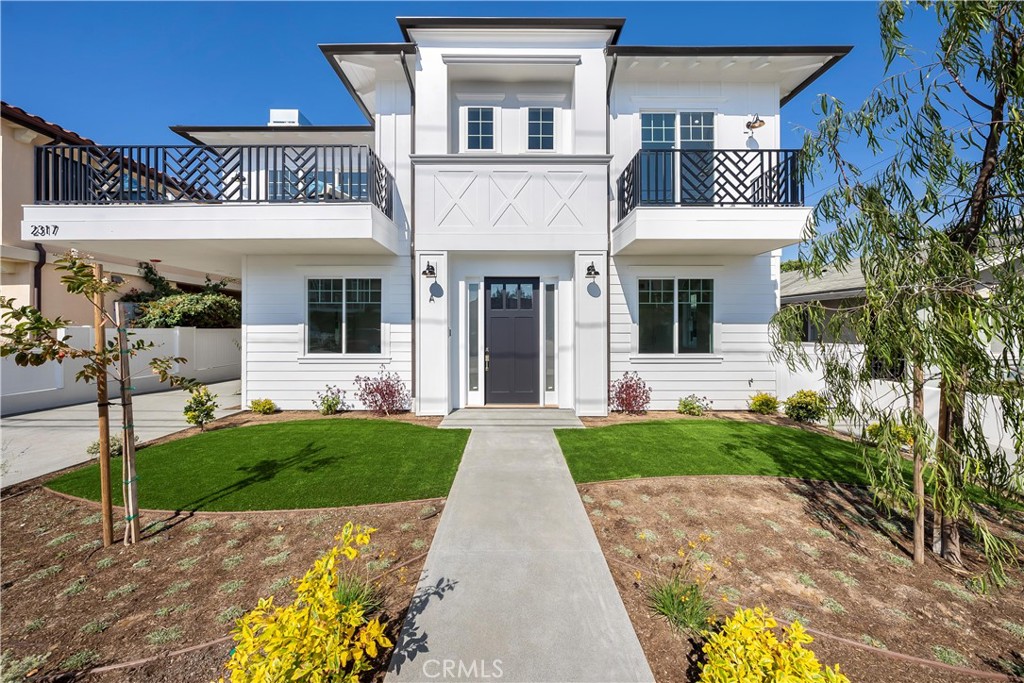 a view of a house with a garden