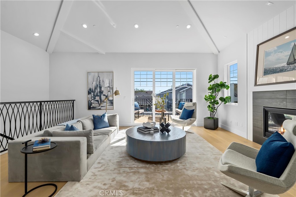 2317 Vanderbilt Lane, Unit A Redondo Beach, CA 90278 - Photo 12 of 39 a living room with furniture and a potted plant