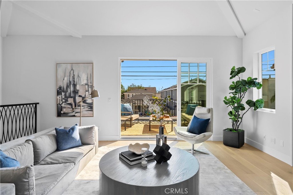 2317 Vanderbilt Lane, Unit A Redondo Beach, CA 90278 - Photo 13 of 39 a living room with furniture and a potted plant
