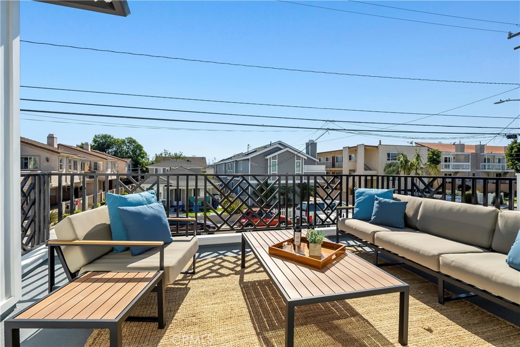 2317 Vanderbilt Lane, Unit A Redondo Beach, CA 90278 - Photo 15 of 39 a balcony with furniture and a potted plant