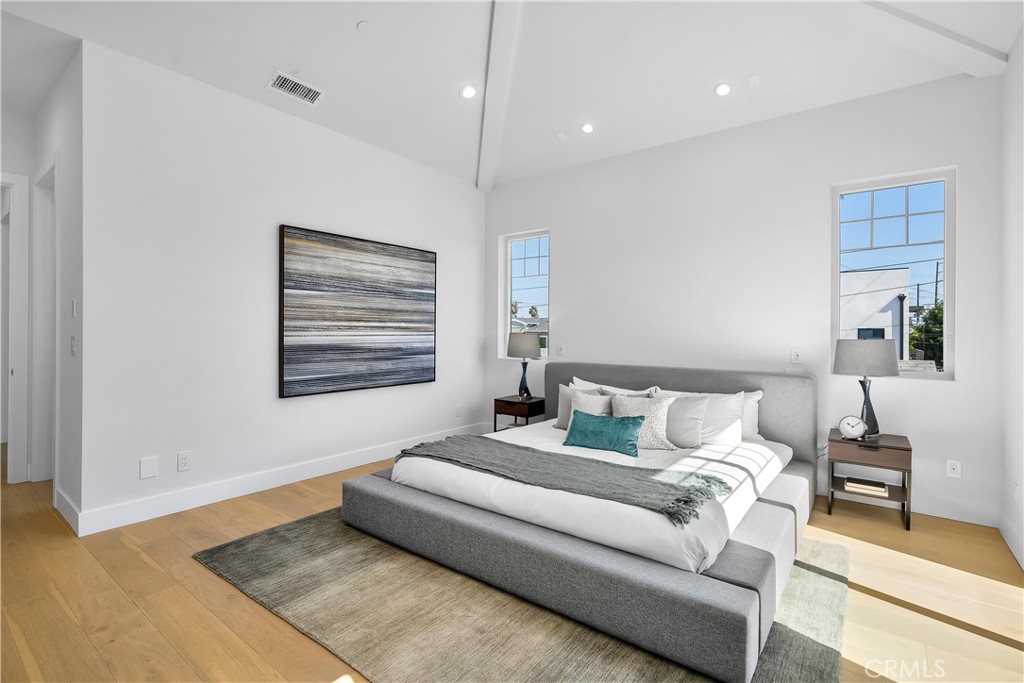 2317 Vanderbilt Lane, Unit A Redondo Beach, CA 90278 - Photo 19 of 39 a bedroom with a bed couch and a window