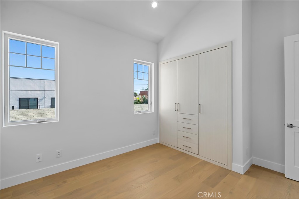 2317 Vanderbilt Lane, Unit A Redondo Beach, CA 90278 - Photo 32 of 39 a view of an empty room with closet and a window