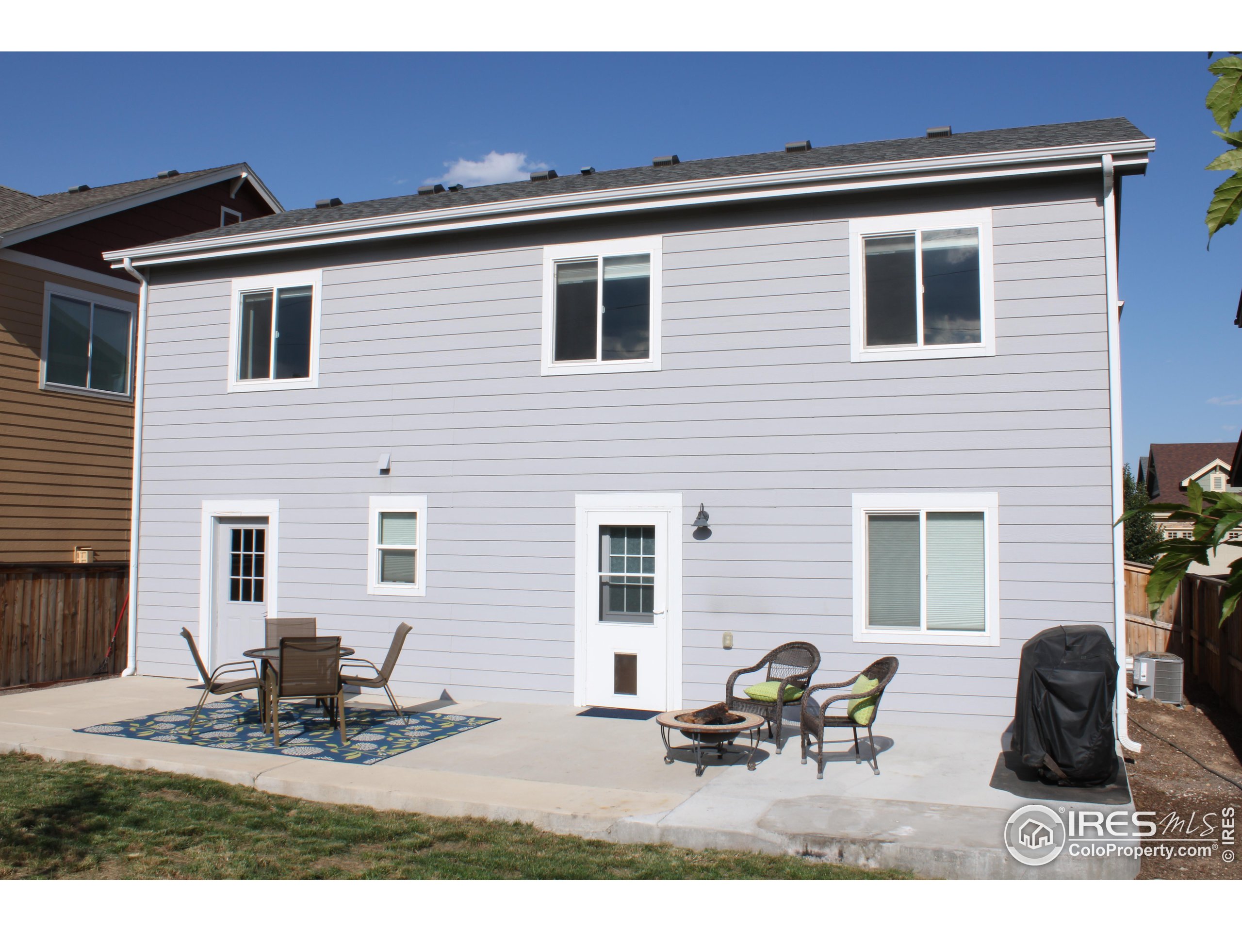 2263 Adobe Drive Fort Collins, CO 80525 - Photo 25 of 25 a view of house with backyard outdoor seating space