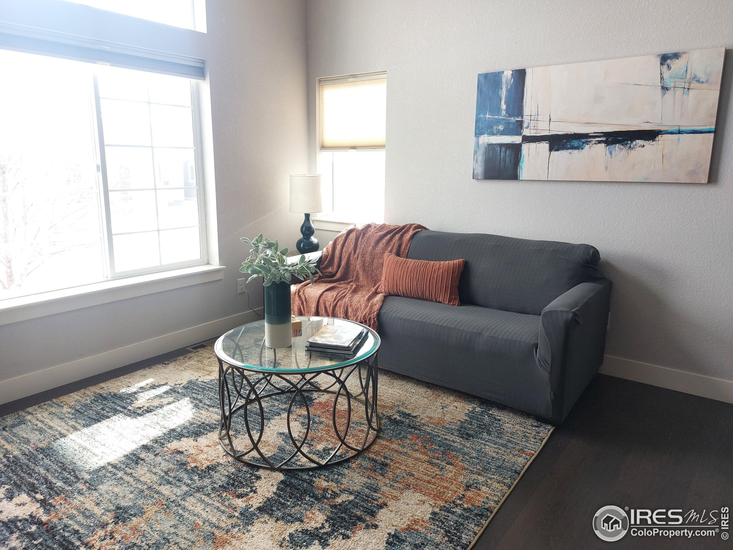 2263 Adobe Drive Fort Collins, CO 80525 - Photo 5 of 25 a living room with furniture and a window