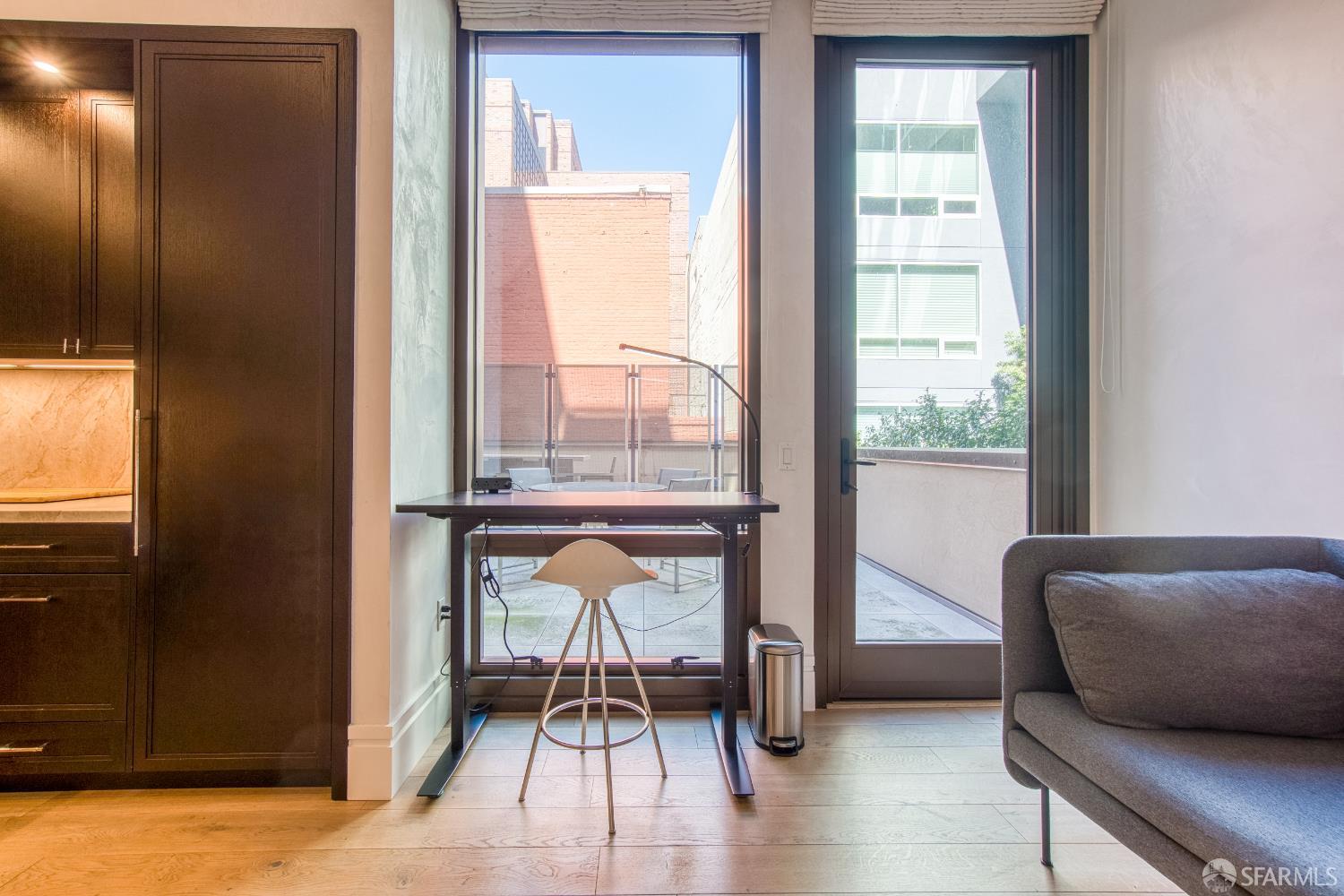 288 Pacific Avenue, Unit 2F San Francisco, CA 94111 - Photo 24 of 34 a living room with furniture and a window