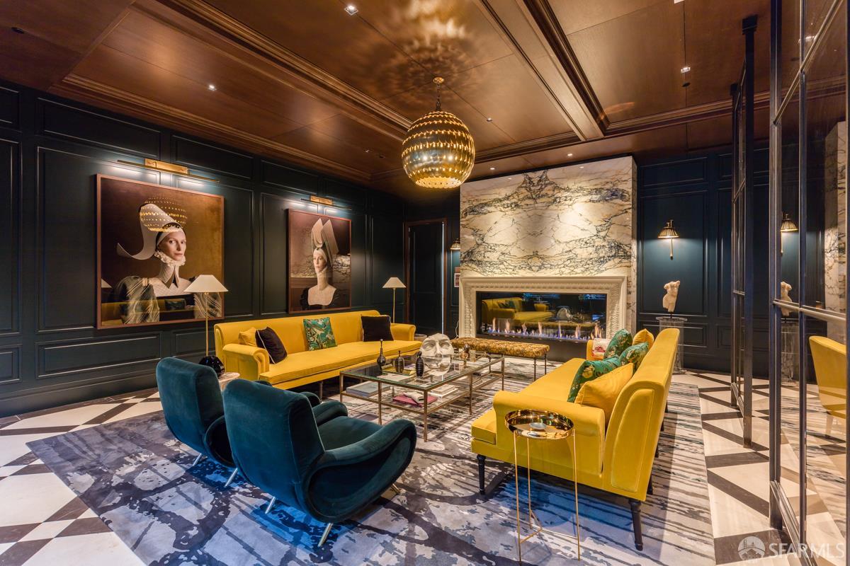 288 Pacific Avenue, Unit 2F San Francisco, CA 94111 - Photo 4 of 34 a living room with furniture a fireplace and a flat screen tv