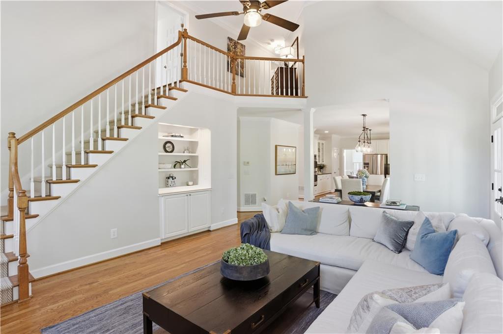 4662 Gilhams Road Roswell, GA 30075 - Photo 21 of 71 a living room with furniture and wooden floor