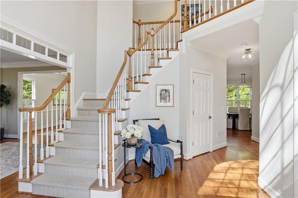 4662 Gilhams Road Roswell, GA 30075 - Photo 5 of 71 a view of entryway with wooden floor and a livingroom
