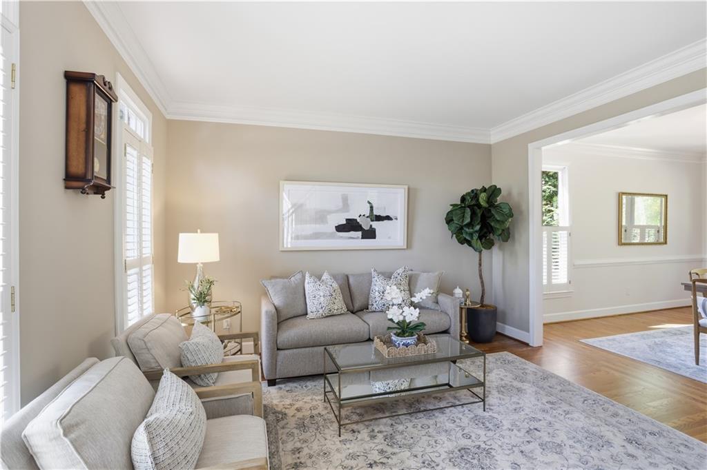 4662 Gilhams Road Roswell, GA 30075 - Photo 7 of 71 a living room with furniture and a potted plant