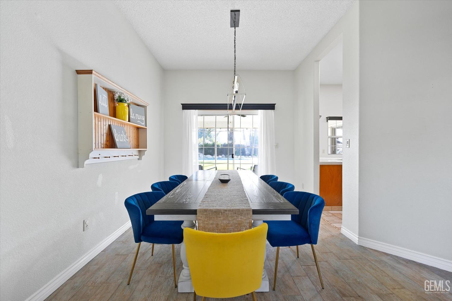 Undisclosed Address Bakersfield, CA 93308 - Photo 11 of 48 a dining room with furniture and window