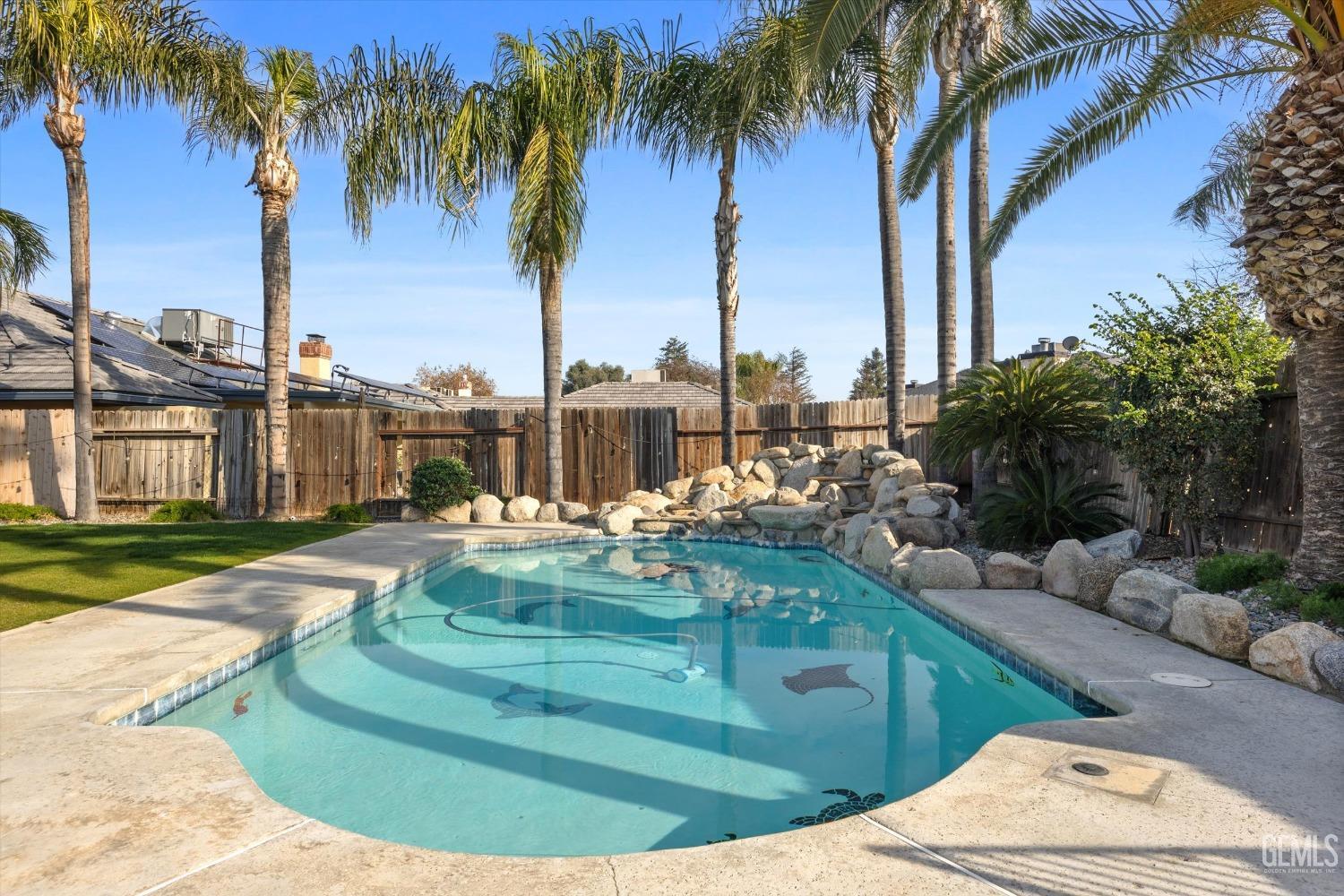 Undisclosed Address Bakersfield, CA 93308 - Photo 41 of 48 a view of a swimming pool with a patio and a lake view