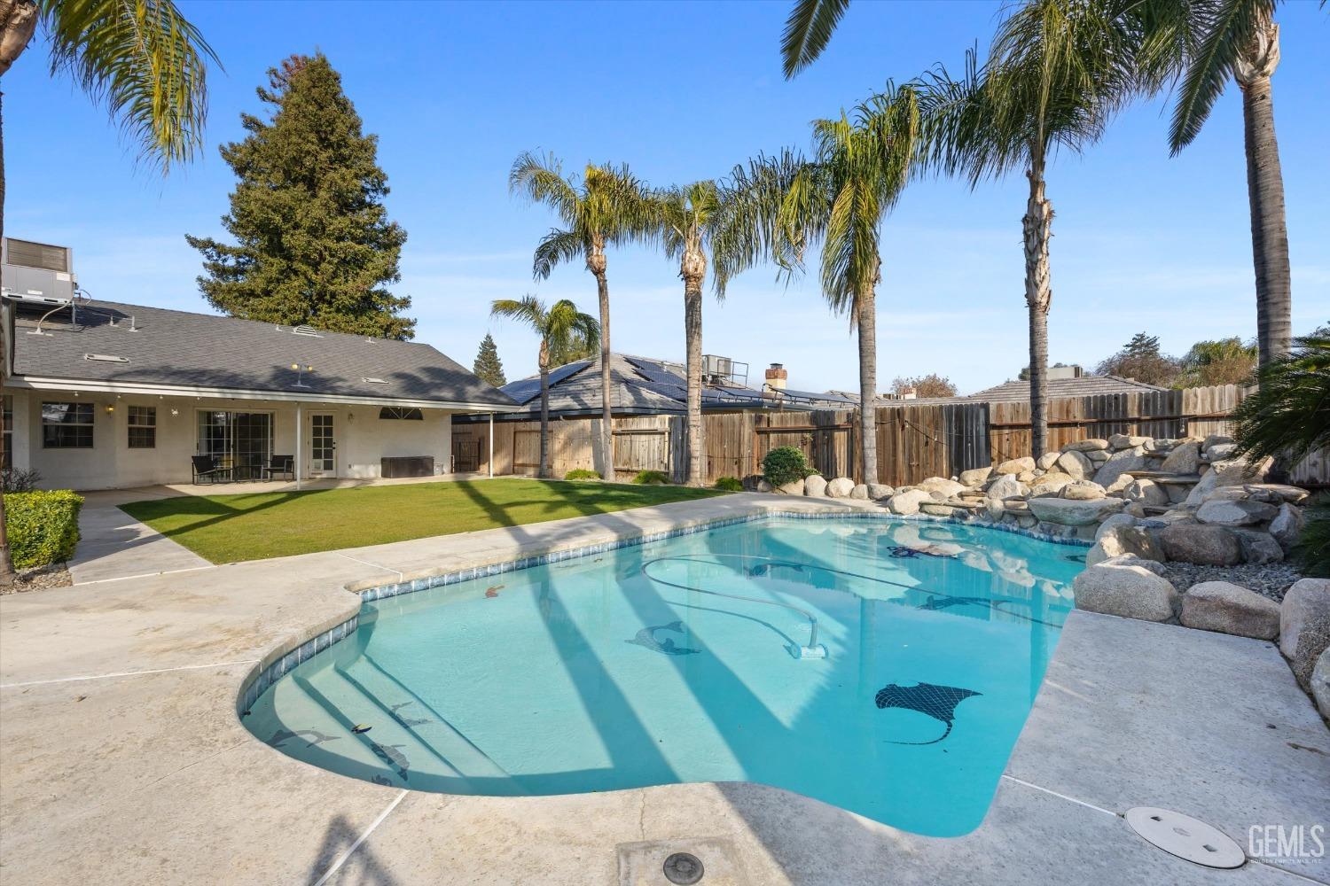 Undisclosed Address Bakersfield, CA 93308 - Photo 42 of 48 a view of a swimming pool with a patio