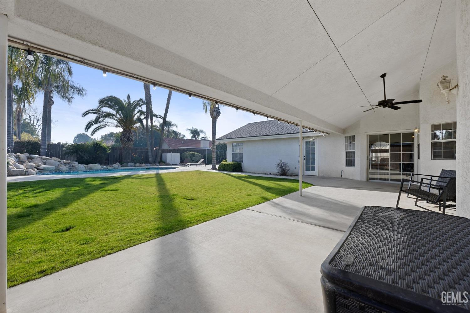 Undisclosed Address Bakersfield, CA 93308 - Photo 44 of 48 a view of house with swimming pool yard and outdoor seating