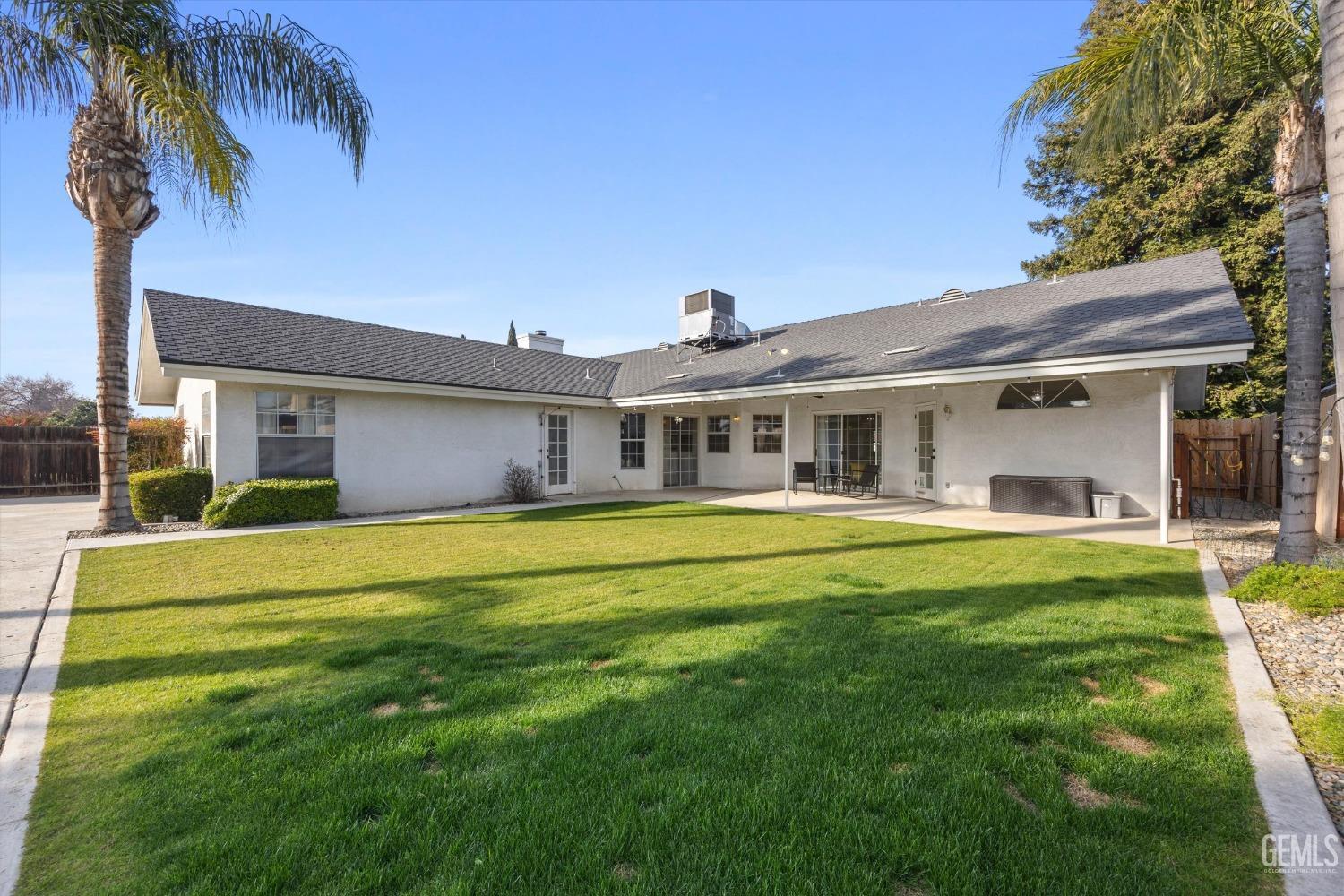 Undisclosed Address Bakersfield, CA 93308 - Photo 46 of 48 a front view of a house with swimming pool having outdoor seating