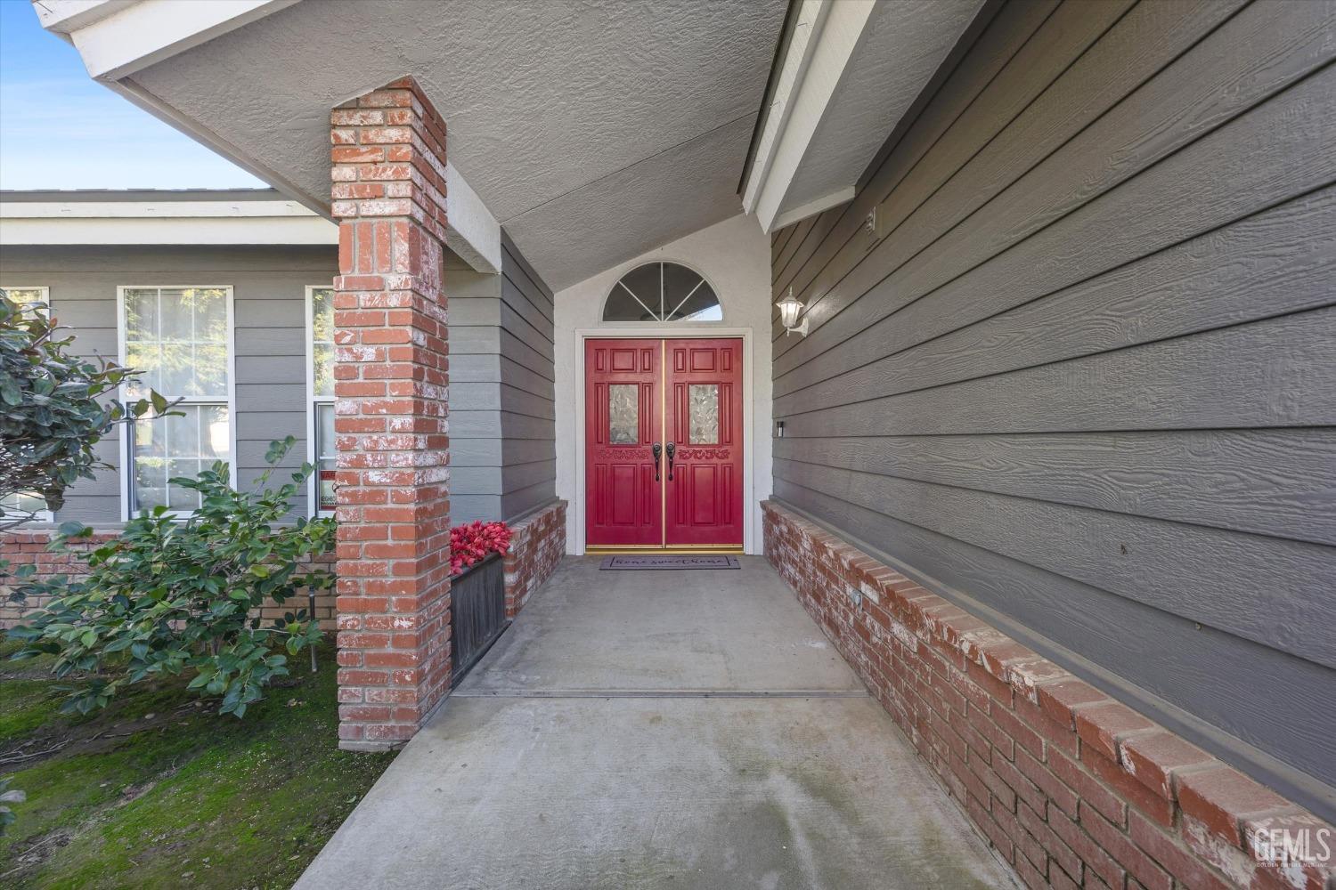 Undisclosed Address Bakersfield, CA 93308 - Photo 5 of 48 a view of entryway with a yard