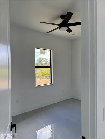 a kitchen with a sink a stove and refrigerator