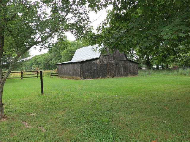 2255 Thompson Road Murfreesboro, TN 37128 - Photo 19 of 20 a view of a backyard with a small cabin