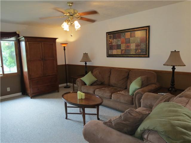 2255 Thompson Road Murfreesboro, TN 37128 - Photo 3 of 20 a living room with furniture and a chandelier