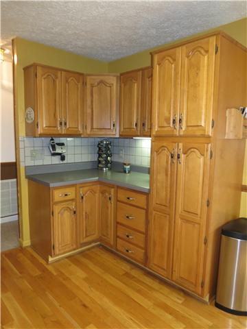 2255 Thompson Road Murfreesboro, TN 37128 - Photo 6 of 20 a kitchen with granite countertop a sink cabinets stainless steel appliances and a window