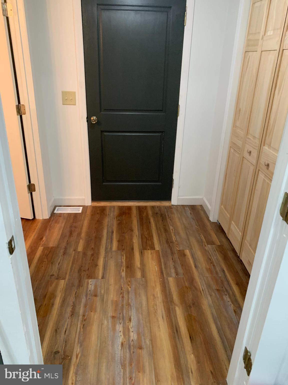 Back door Bath on the left closet on the right