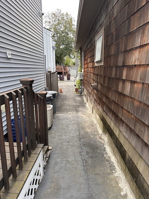 10 Sachem Road Weymouth, MA 02191 - Photo 15 of 19 a view of a pathway with a backyard