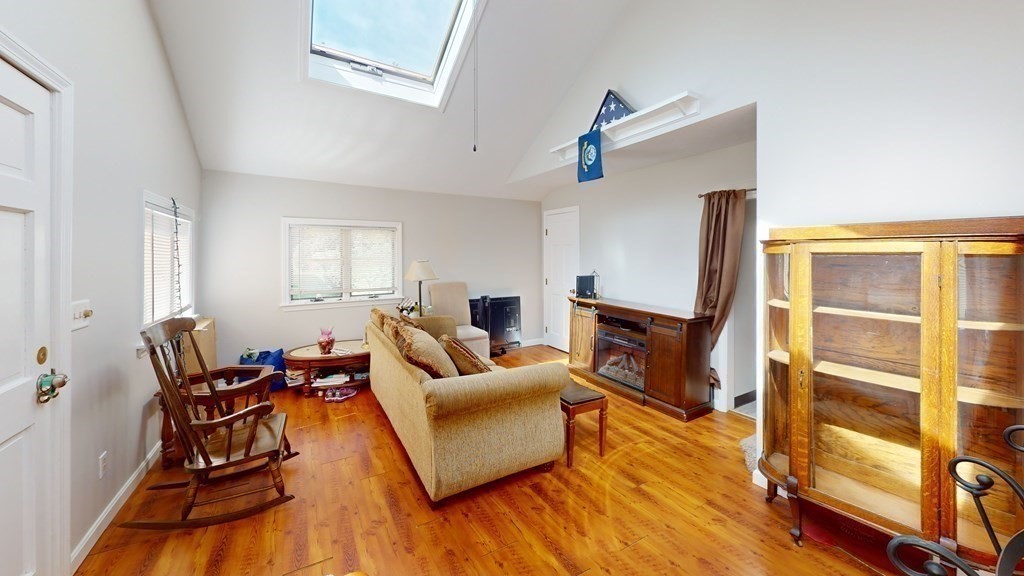10 Sachem Road Weymouth, MA 02191 - Photo 5 of 19 a living room with furniture and a wooden floor