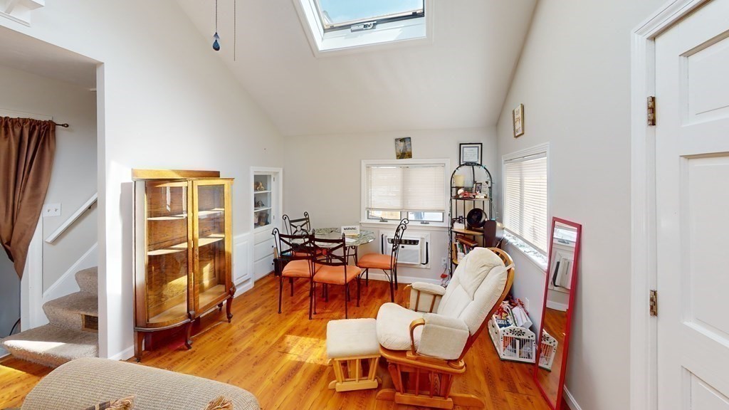 10 Sachem Road Weymouth, MA 02191 - Photo 6 of 19 a living room with furniture a wooden floor and a window