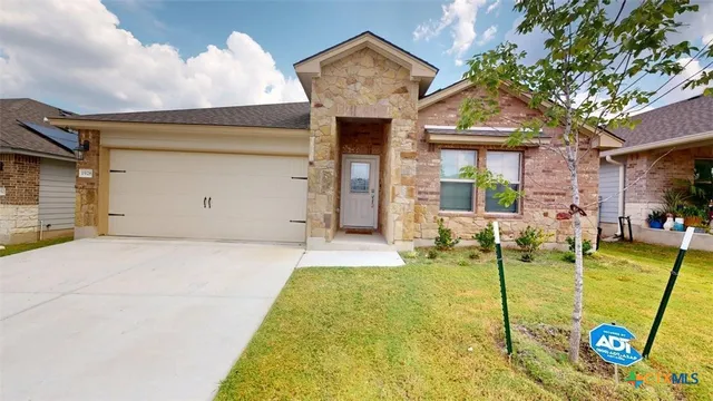 front view of house with a yard