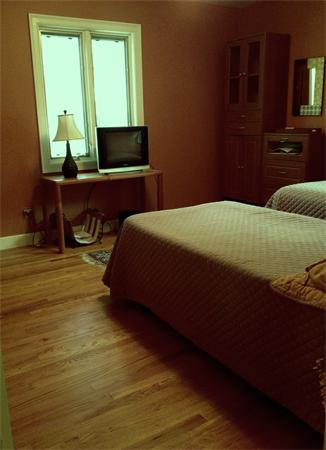 10 Colonial Road Wilbraham, MA 01095 - Photo 16 of 22 a bedroom with a bed tv and dresser