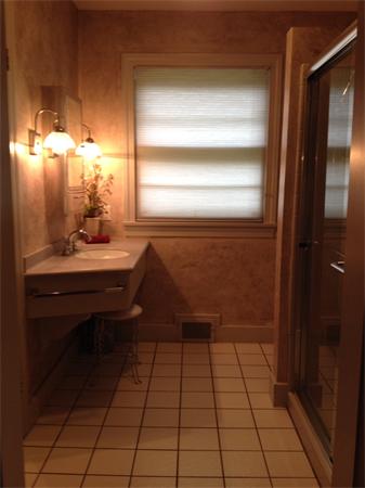 10 Colonial Road Wilbraham, MA 01095 - Photo 19 of 22 a bathroom with a sink a toilet and a mirror