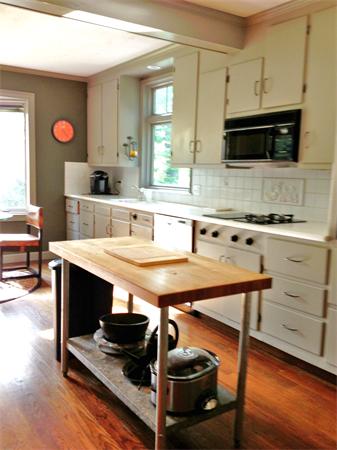 10 Colonial Road Wilbraham, MA 01095 - Photo 8 of 22 a living room with stainless steel appliances kitchen island granite countertop furniture and a wooden floor