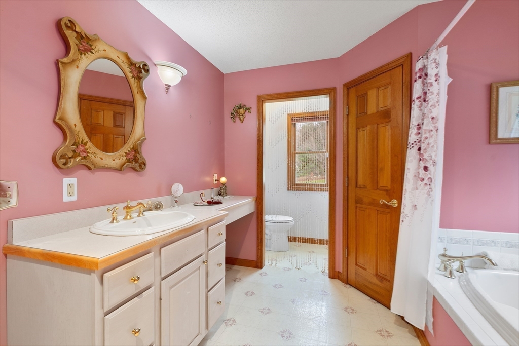 15 Sturbridge Road Brimfield, MA 01010 - Photo 11 of 36 a bathroom with a sink and a mirror