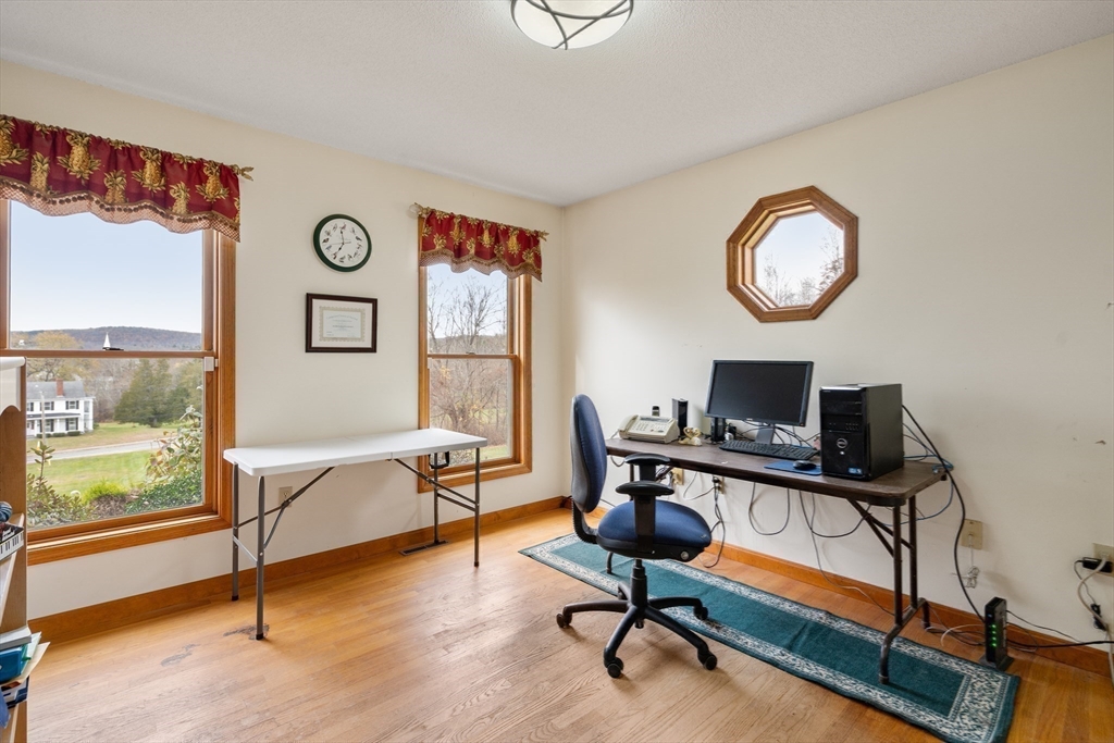 15 Sturbridge Road Brimfield, MA 01010 - Photo 13 of 36 a view of a workspace with furniture and a window