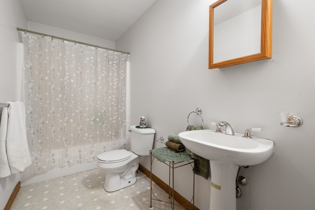 15 Sturbridge Road Brimfield, MA 01010 - Photo 16 of 36 a bathroom with a sink toilet and mirror