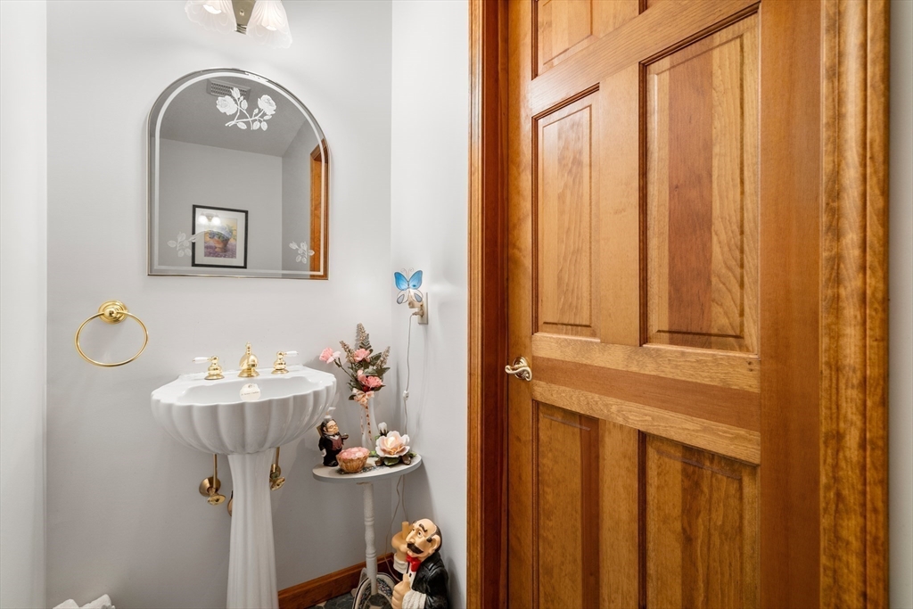15 Sturbridge Road Brimfield, MA 01010 - Photo 17 of 36 a bathroom with a sink a mirror and a window
