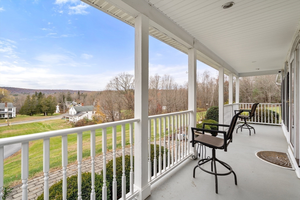 15 Sturbridge Road Brimfield, MA 01010 - Photo 25 of 36 a view of a chair and tables in the balcony