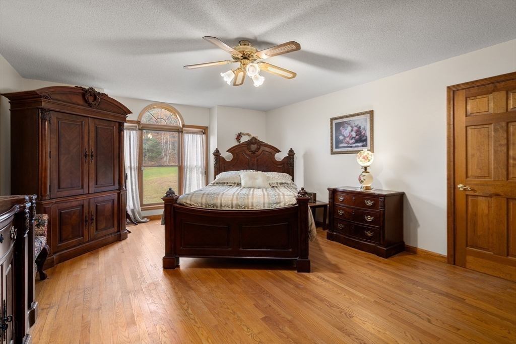 15 Sturbridge Road Brimfield, MA 01010 - Photo 9 of 36 a living room with furniture and a flat screen tv