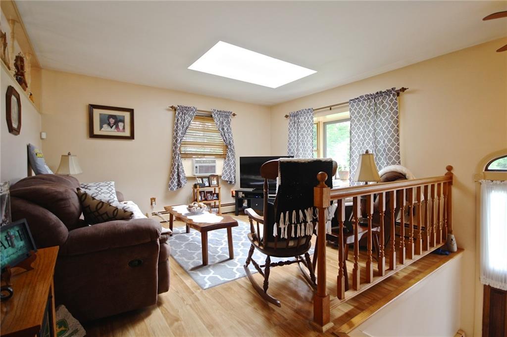 941 Bridgton Road Westbrook, ME 04092 - Photo 6 of 35 Your living room with nice flooring...