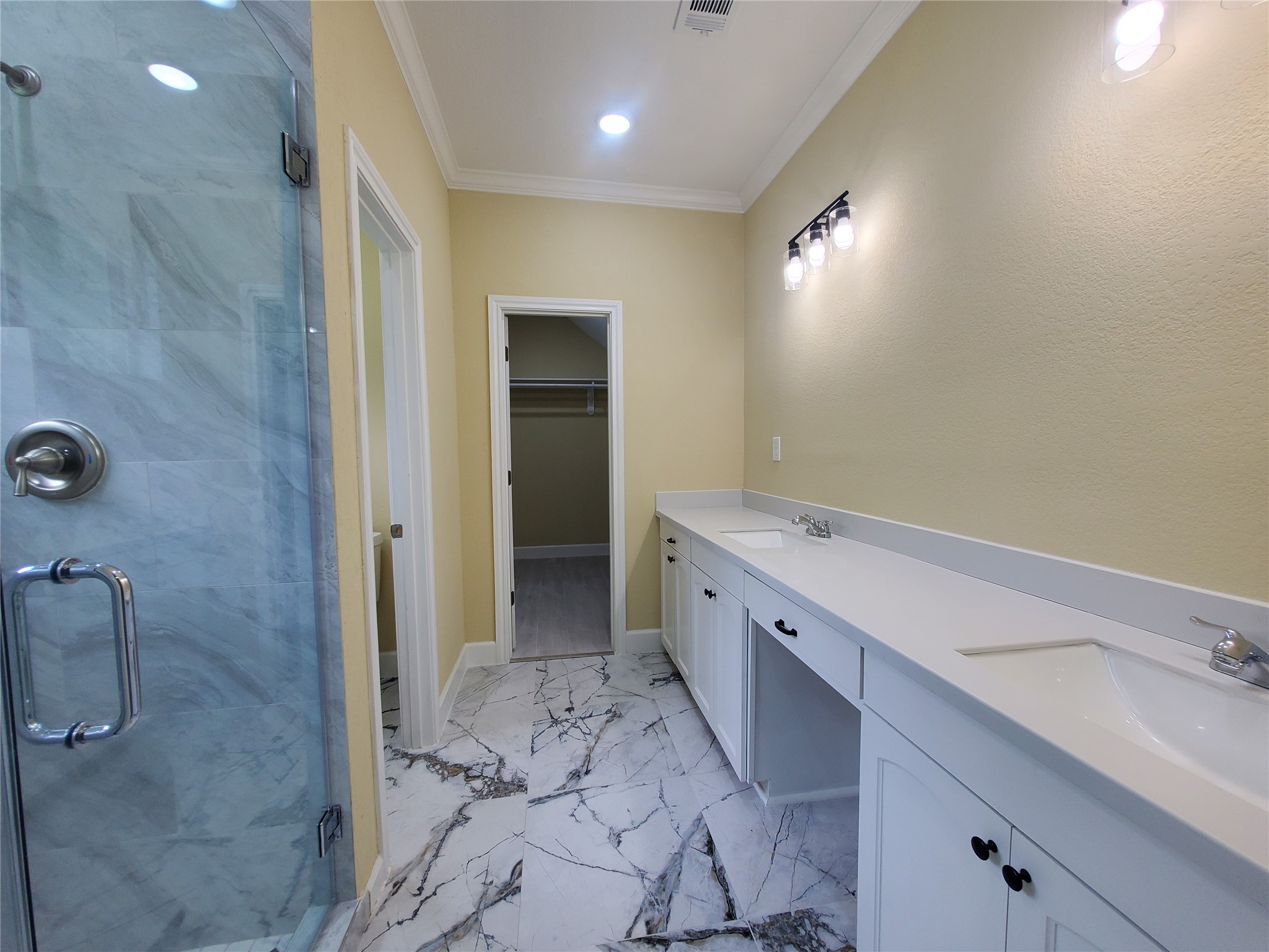 1306 North 9th Street Conroe, TX 77301 - Photo 32 of 47 a spacious bathroom with a granite countertop sink mirror and shower